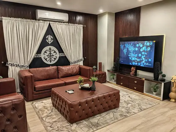 Mahogany Lounge: Tufted leather lounge and two statement bedrooms