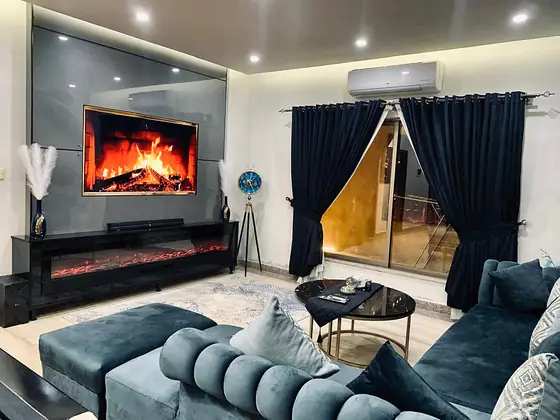 Photo 3 of Aurora Lounge: Bahria Town Apartment with Pool Table and Electric Fireplace