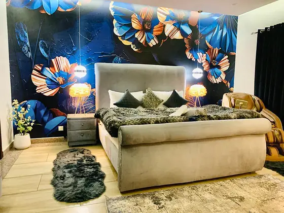 Photo 5 of Aurora Lounge: Bahria Town Apartment with Pool Table and Electric Fireplace