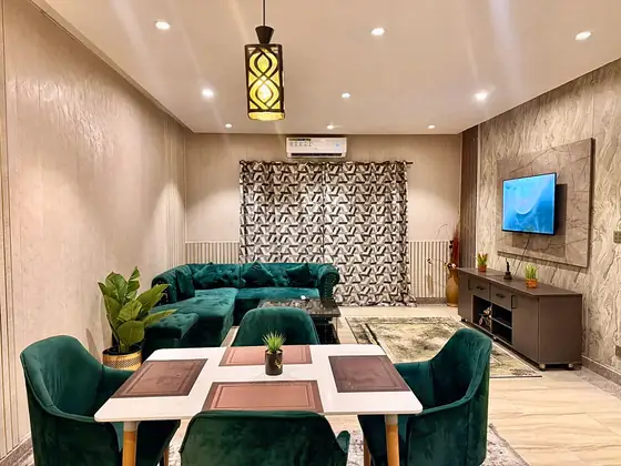 Photo 3 of Emerald Residence: Modern Furnished Apartment, Velvet and Brass