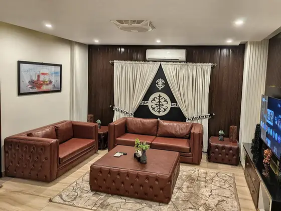 Photo 2 of Mahogany Lounge: 2 Bedroom Furnished Apartment, Leather Lounge