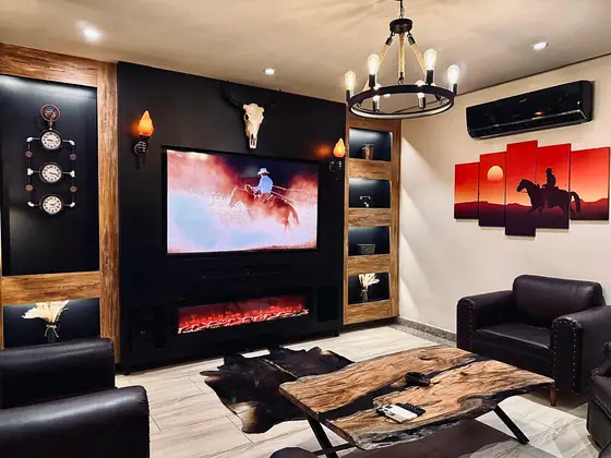 Photo 3 of Frontier Lodge: Bahria Town Apartment with Pool Table, Fireplace and Home Cinema