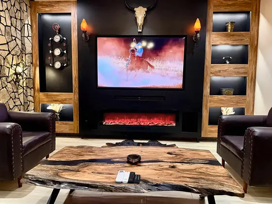 Photo 4 of Frontier Lodge: Bahria Town Apartment with Pool Table, Fireplace and Home Cinema