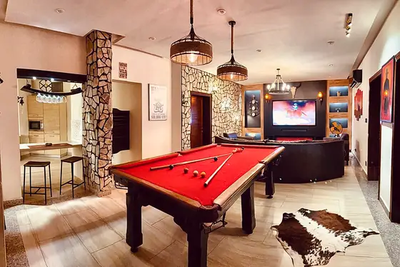 Photo 5 of Frontier Lodge: Bahria Town Apartment with Pool Table, Fireplace and Home Cinema
